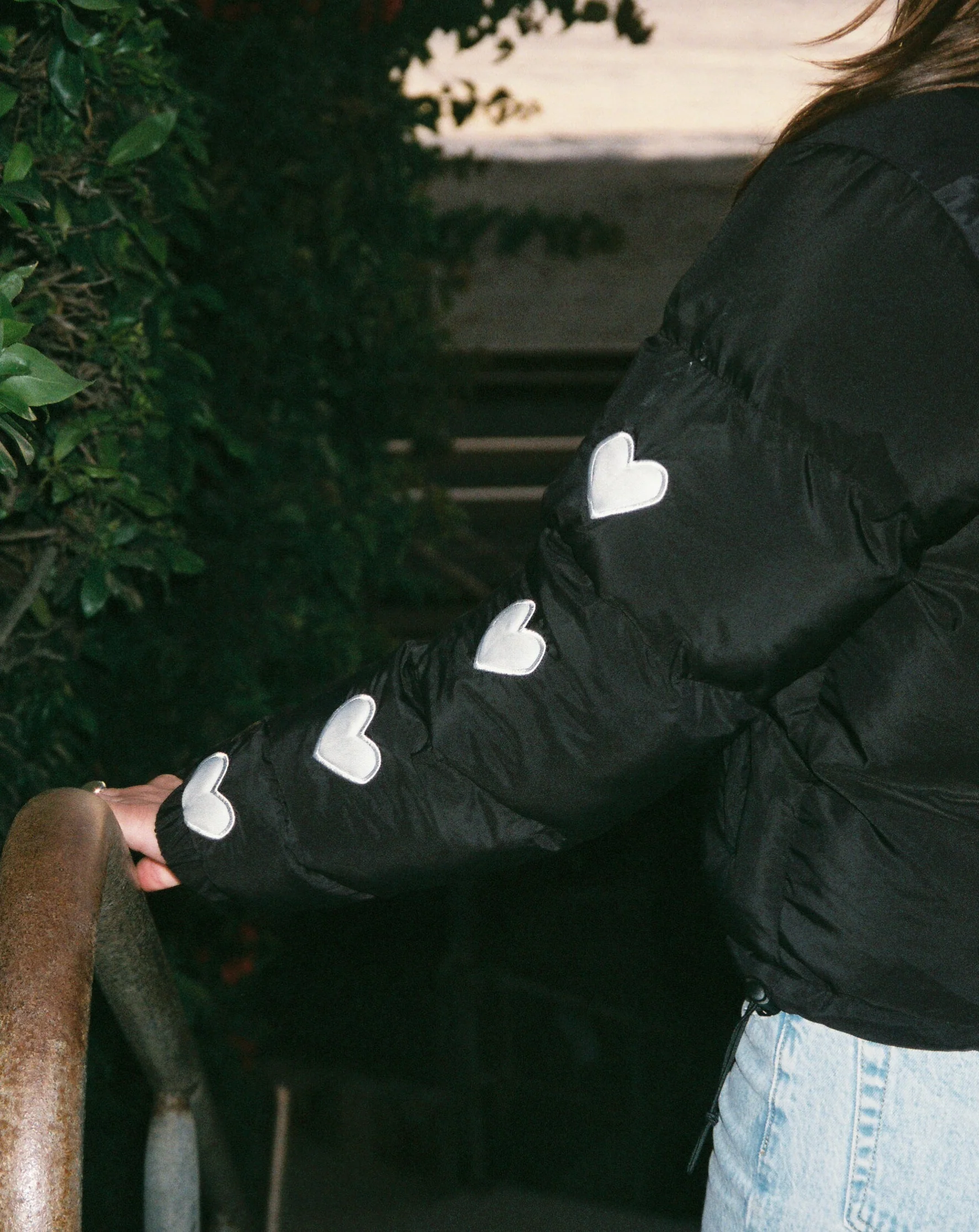 "Heart on My Sleeve" Puffer Jacket in Black - Image 10